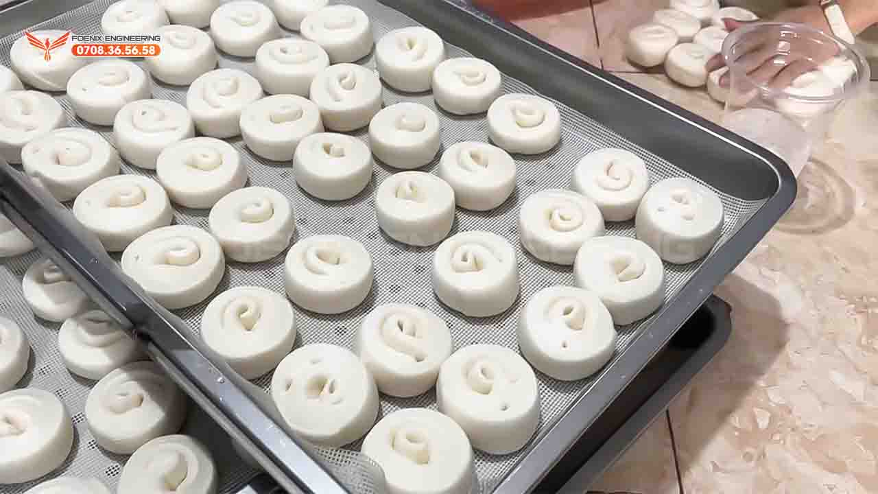 Giao máy làm màn thầu